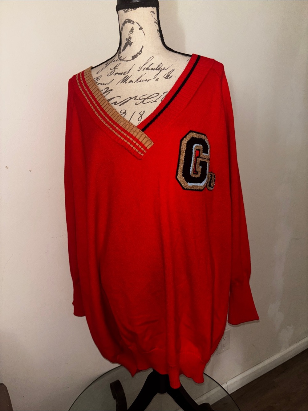 Gabrielle union Red V-Neck Sweater with Letter Patch